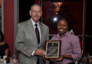 Jim presents 12th Annual Trey Hutchison Award to Shreveport Police Corporal Shaunda Holmes.